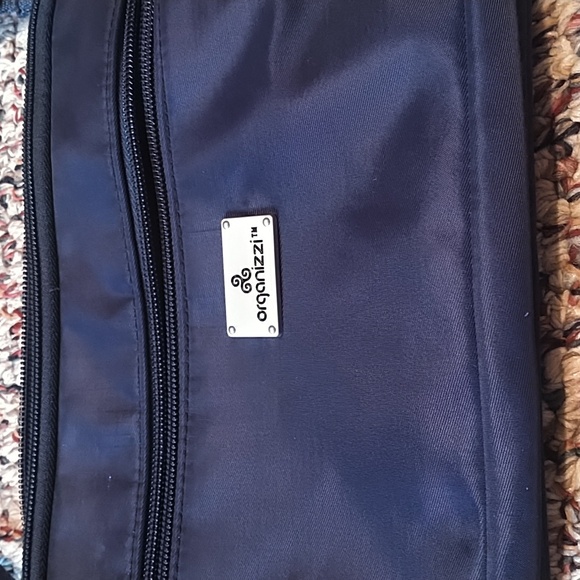 Organizzi Slim Hipster. - Picture 1 of 4
